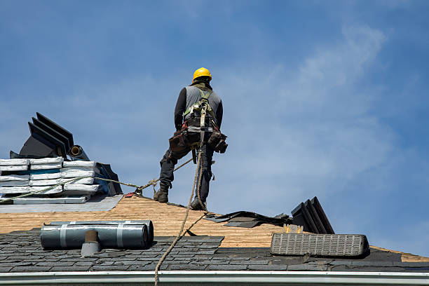 Professional Roofing technician working in Washington Mills, NY